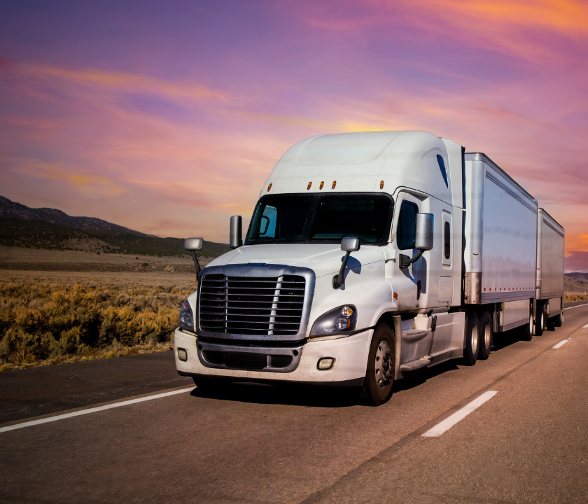 Semi truck during sunset