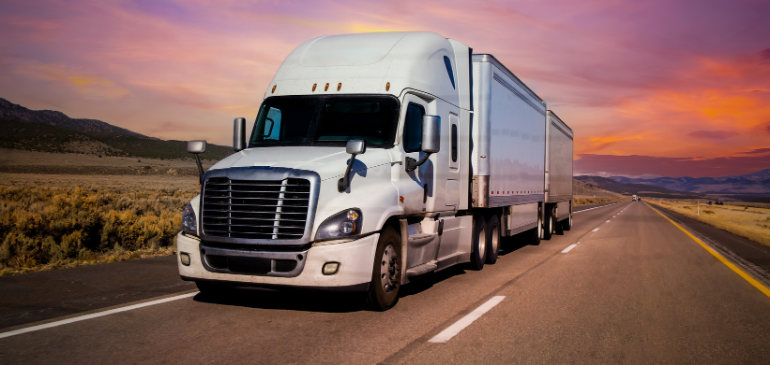 Semi truck during sunset